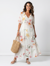 Noa | Robe midi à motifs floraux délicats et à franges en couches