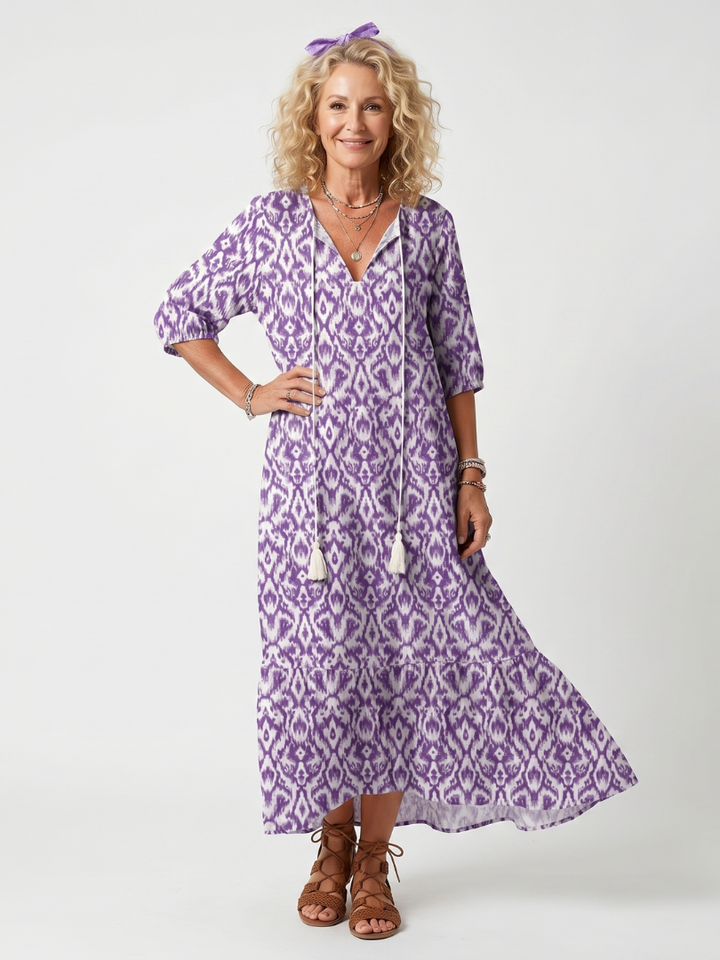 Penelope | Robe midi imprimée à nouage avec pompons