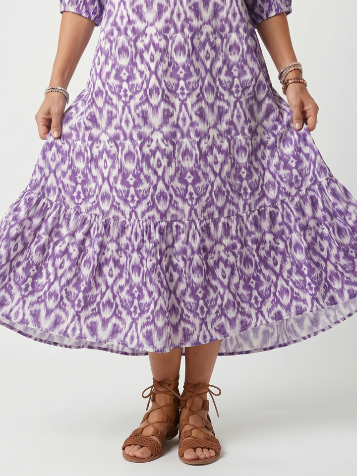 Penelope | Robe midi imprimée à nouage avec pompons