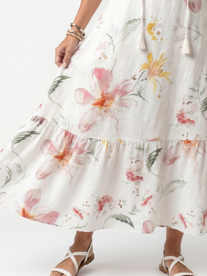 Noa | Robe midi à motifs floraux délicats et à franges en couches