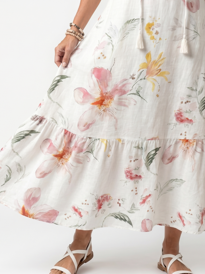 Noa | Robe midi à motifs floraux délicats et à franges en couches