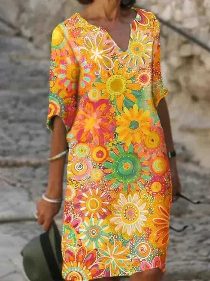 Nira | Robe midi florale éclatante