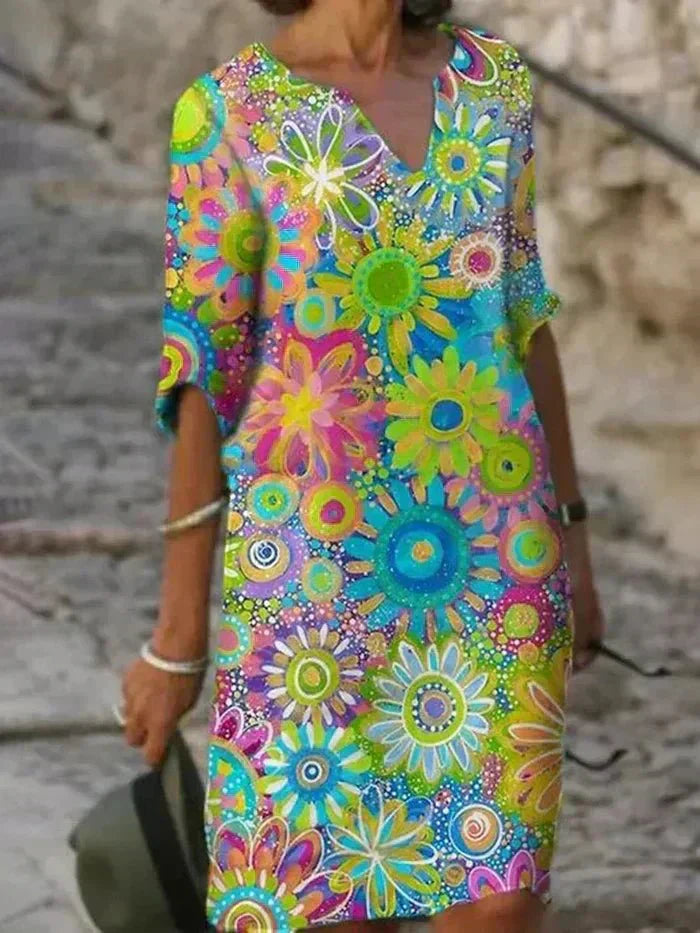 Nira | Robe midi florale éclatante