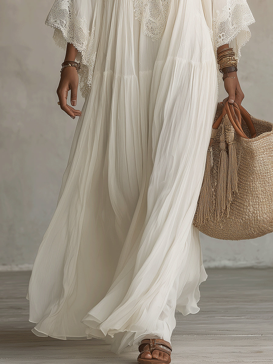 Adelaida | Robe longue en mousseline ivoire avec manches chauve-souris et dentelle blanche