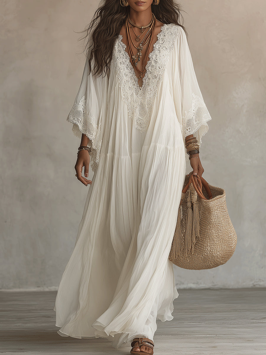 Adelaida | Robe longue en mousseline ivoire avec manches chauve-souris et dentelle blanche