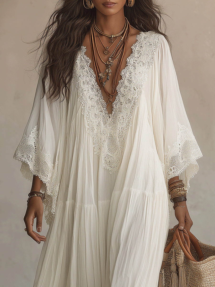 Adelaida | Robe longue en mousseline ivoire avec manches chauve-souris et dentelle blanche