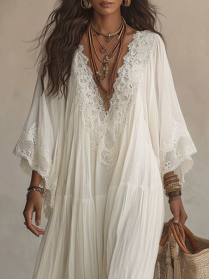 Adelaida | Robe longue en mousseline ivoire avec manches chauve-souris et dentelle blanche