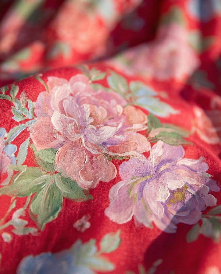 Minelda | Robe élégante à décolleté en V à motifs floraux