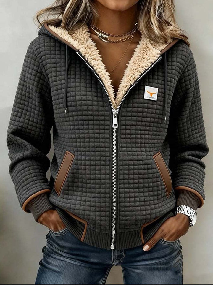 Sandra | Veste matelassée doublée en sherpa avec capuche